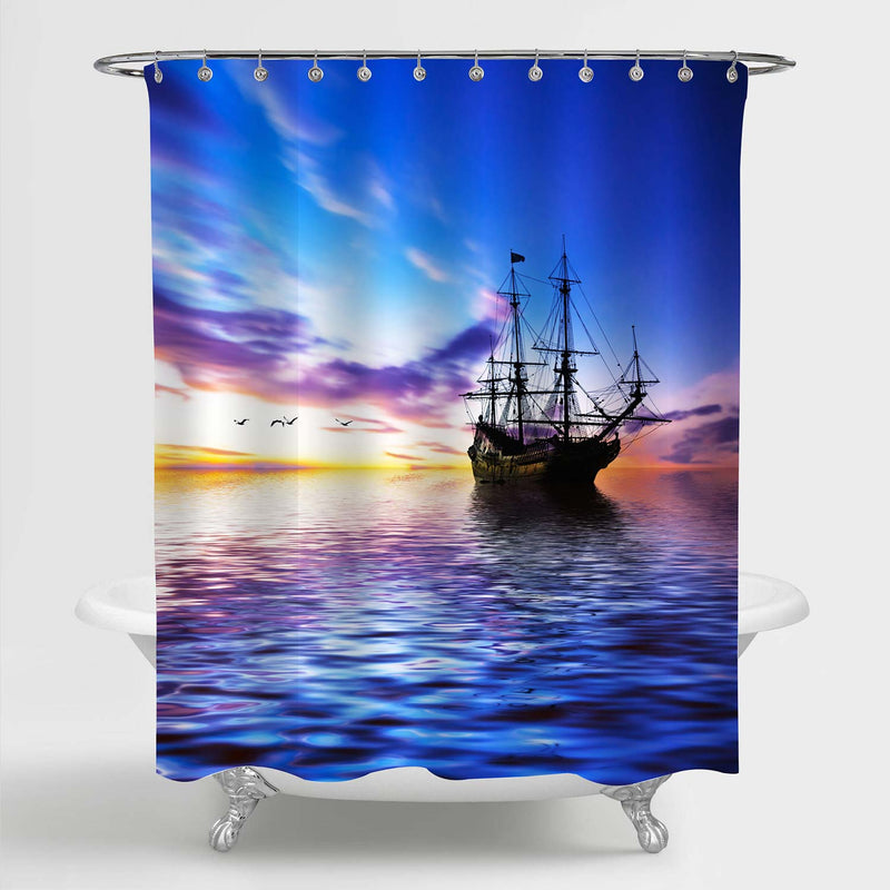 Ancient Sailboat Sails Past the Setting Sun at Sunset on Pacific Ocean Shower Curtain - Blue Gold